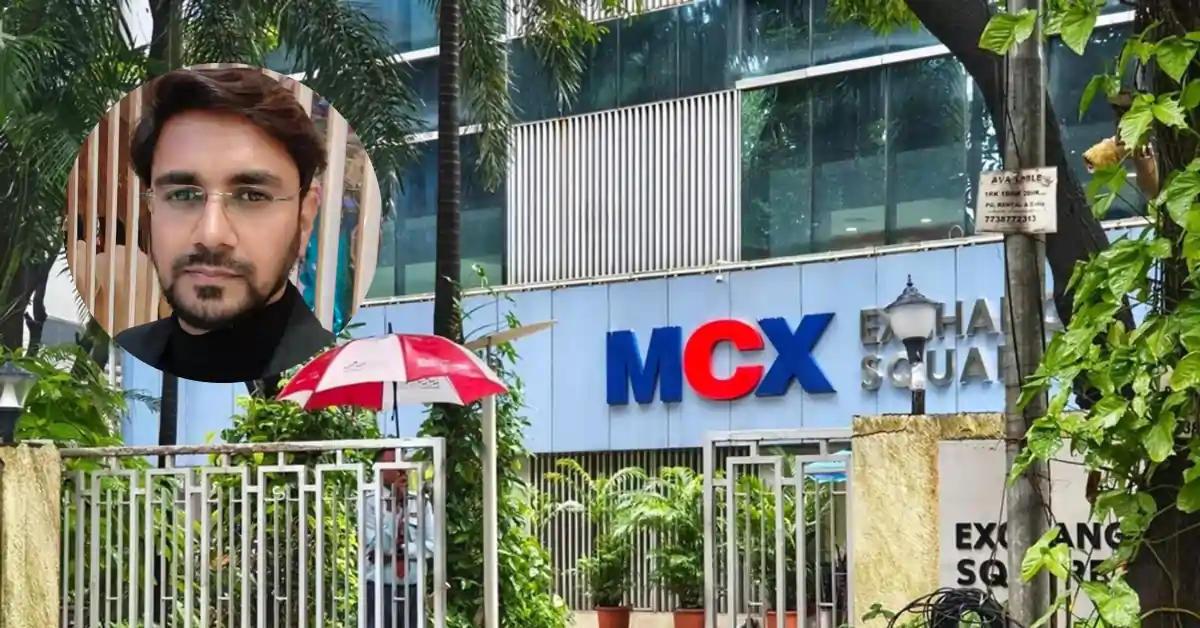 Market expert sharing insights on MCX trading hours revision outside MCX Exchange Square building